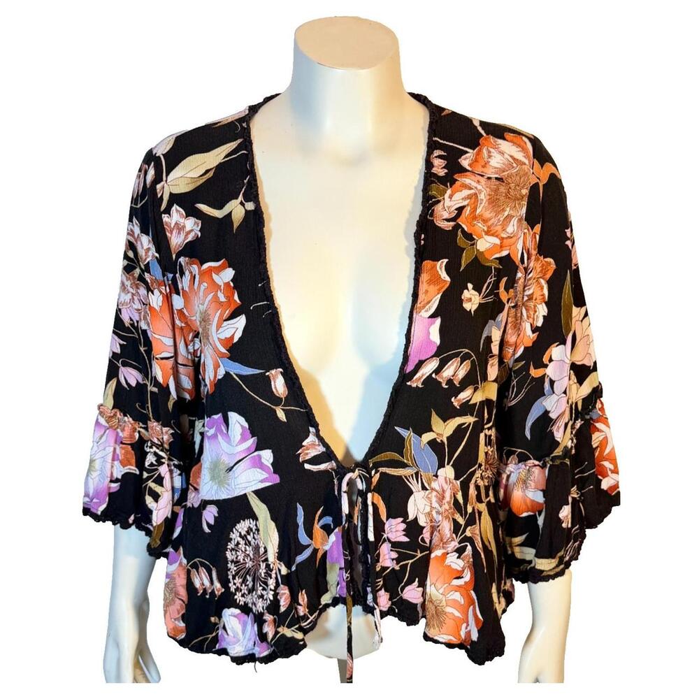 The Knox Rose Blouse Jacket is a stylish and versatile piece designed for women